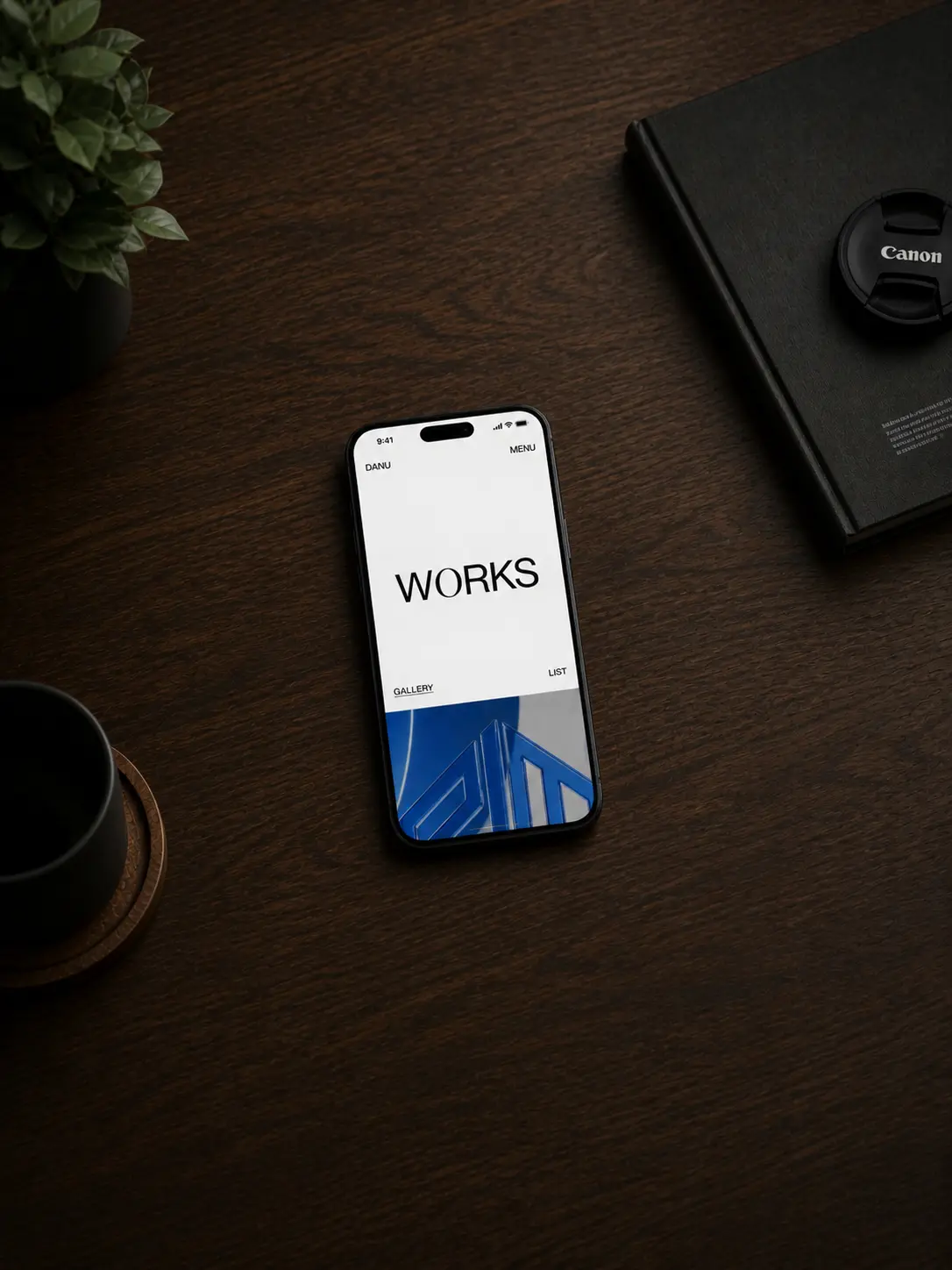 Mobile phone displaying a website mockup by Danu Pratama